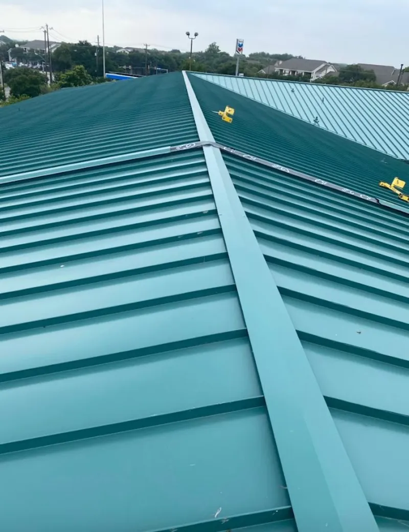 Green commercial metal roof ridge and valley for Metal Roof Repair in Albertville