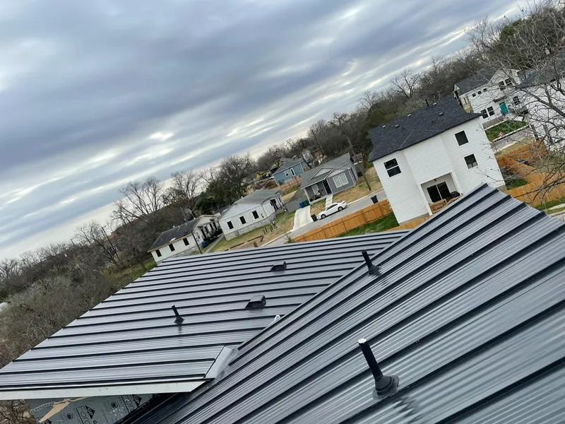 Standing seam metal roof panels with vents for Skylight Repair in Albertville